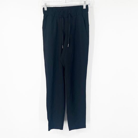 Lululemon On The Fly Pants Woven 27" in Black - Picture 2 of 9